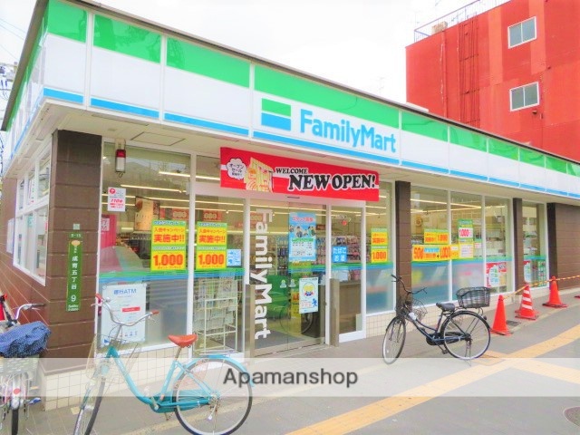 コンビニ　ファミリーマート（コンビニ）まで385m