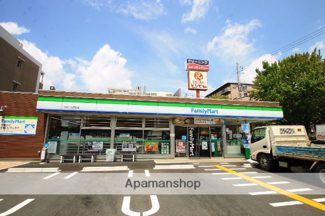 コンビニ　ファミリーマート吹田上山手町店（コンビニ）まで692m