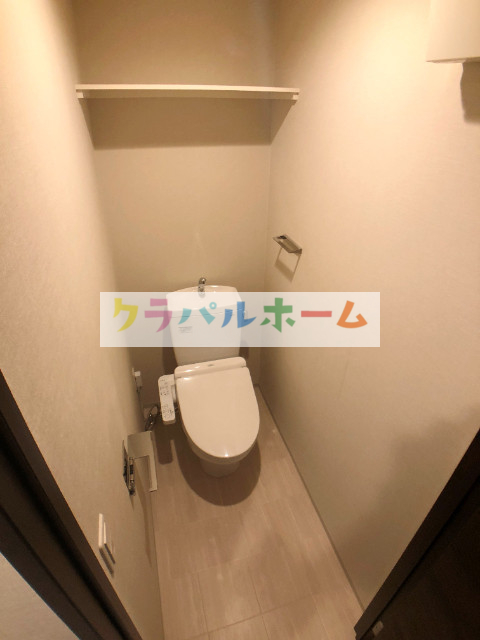 地下鉄御堂筋線 西中島南方駅 徒歩5分 8階建 築7年のトイレ写真