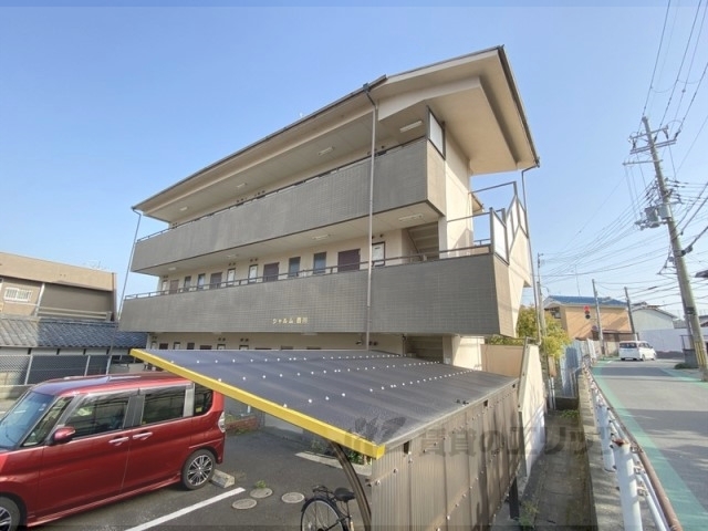 京田辺市田辺鳥本のマンションの建物外観