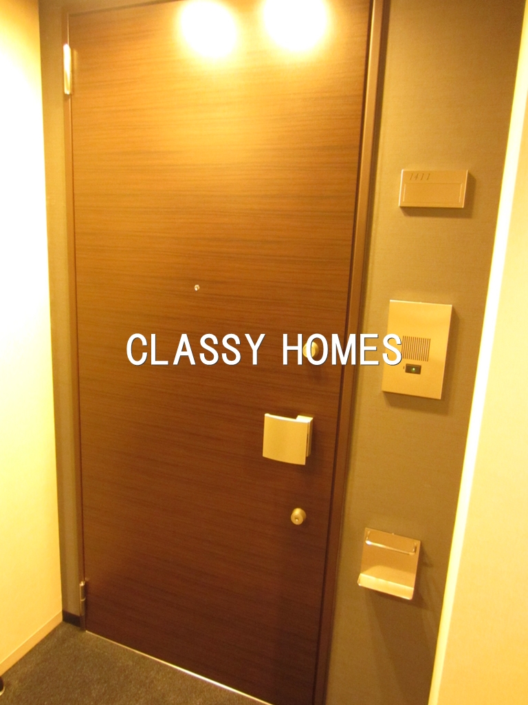 玄関　2007年竣工　クレストプライムタワー芝：玄関ドア