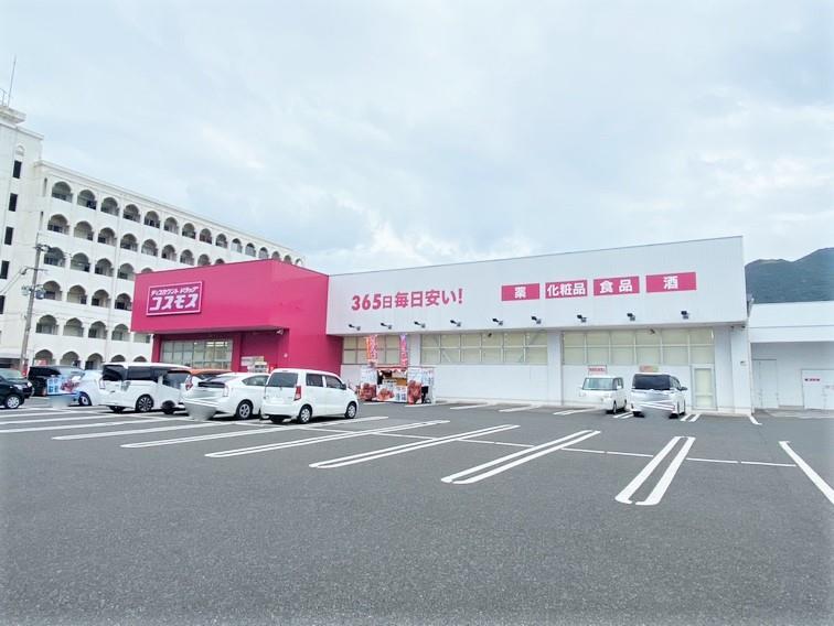 ドラックストア　ディスカウントドラッグコスモス足立店（ドラッグストア）まで500m