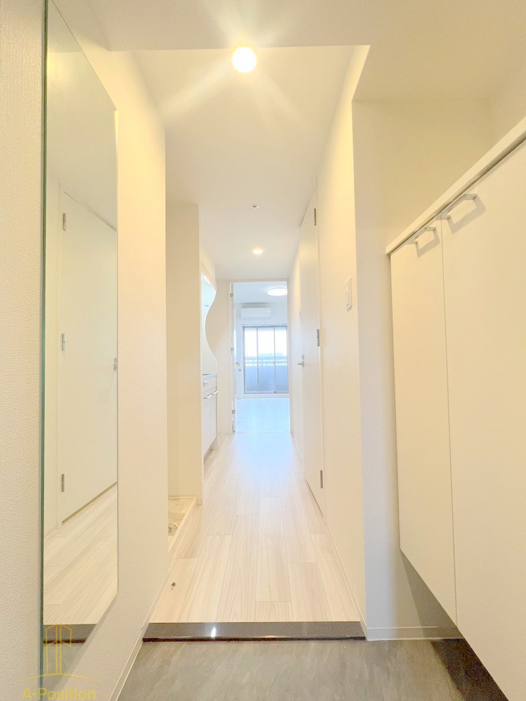 玄関　セレニテ難波グランデシュッド