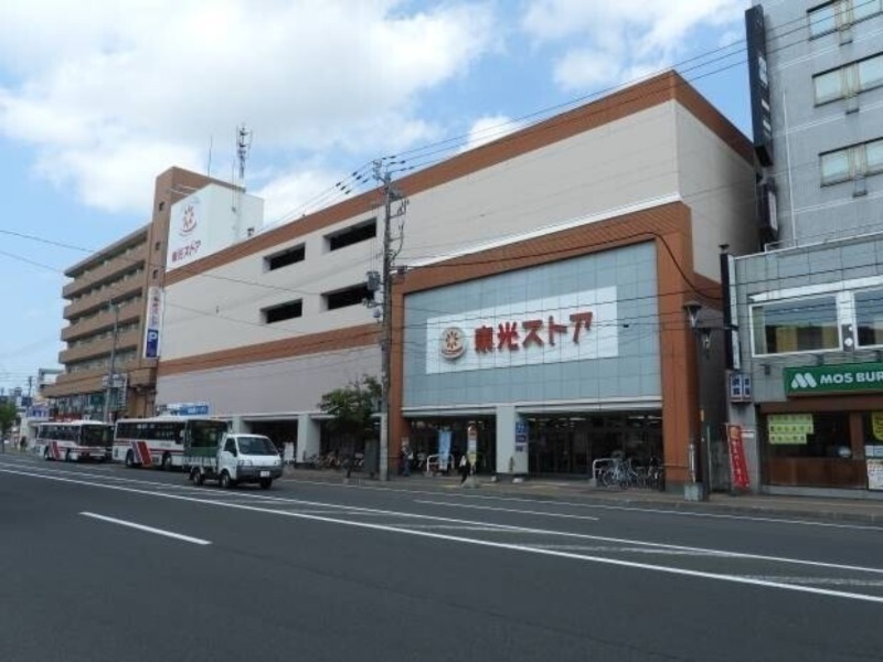 スーパー　東光ストア麻生店（スーパー）まで594m
