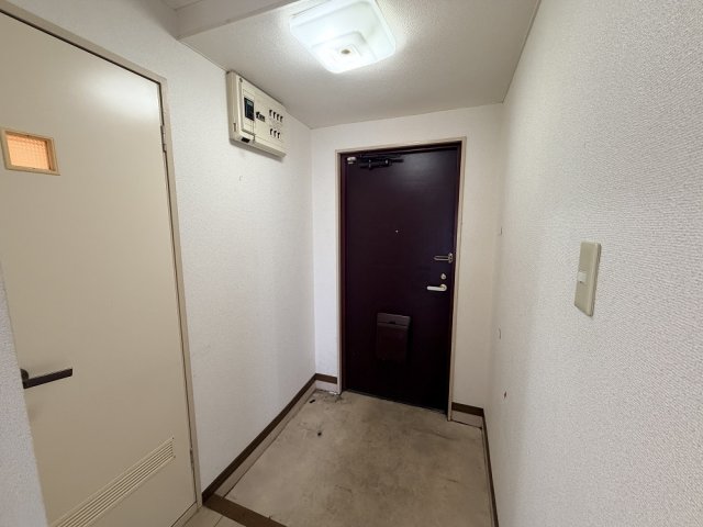 マンションつつみ起の玄関写真
