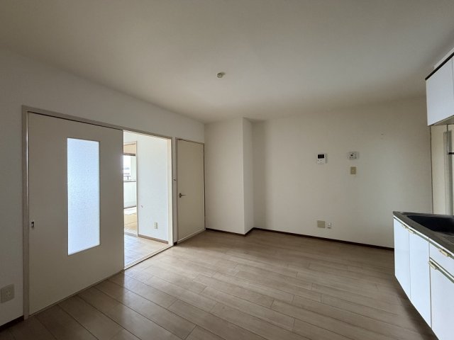マンションつつみ起の居間写真