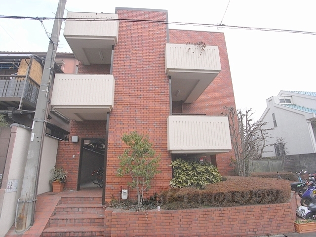 京都市北区紫竹東桃ノ本町のマンションの建物外観