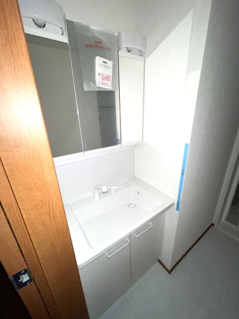 洗面設備　※写真は301号室のものです