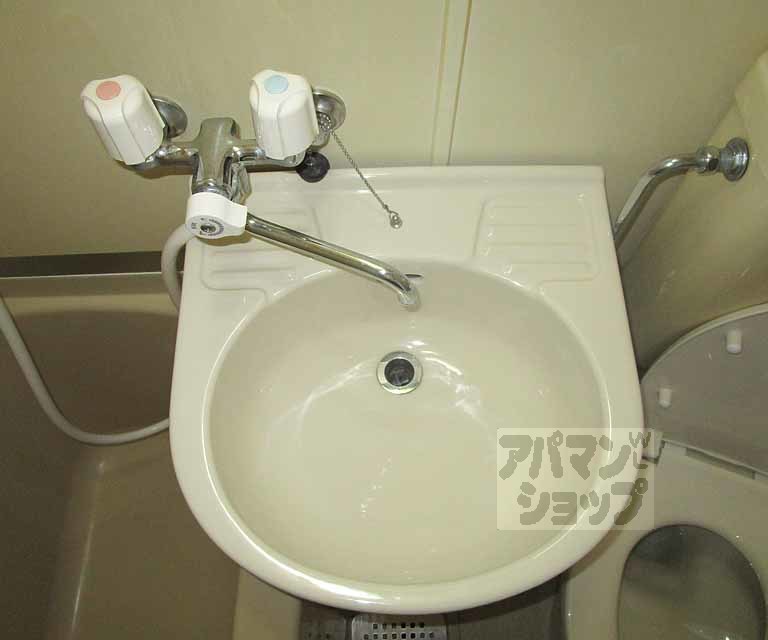 洗面設備　１０４号室の写真です。