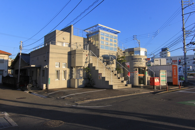 【松山市束本のマンションの郵便局】