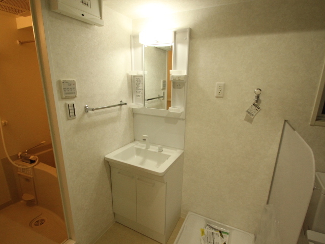 洗面設備　※他部屋の写真です。現況優先。