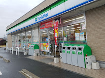 コンビニ　ファミリーマート 鈴鹿庄野町店（コンビニ）まで1093m