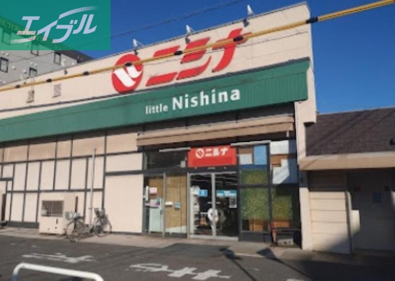スーパー　ニシナフードバスケット本店（スーパー）まで755m