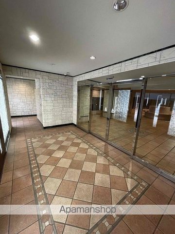 都営大江戸線 六本木駅 徒歩8分 15階建 築24年の外観写真
