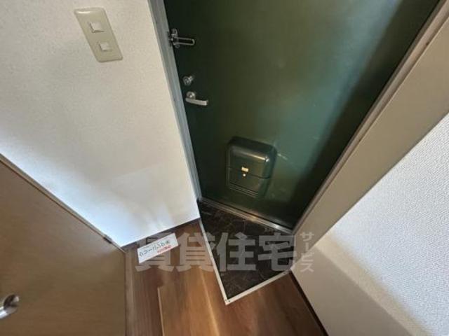 エスト長居西の玄関写真