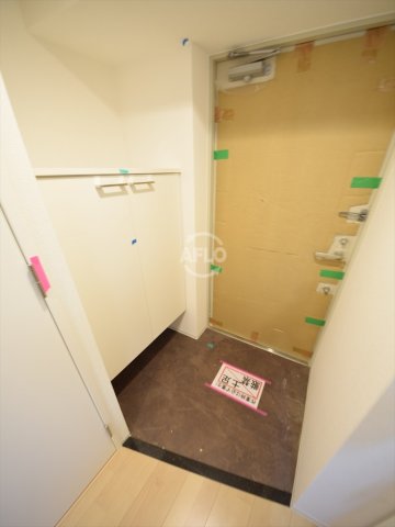 地下鉄御堂筋線 心斎橋駅 徒歩5分 15階建 築9年の玄関写真