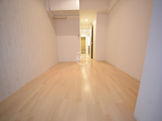 地下鉄御堂筋線 心斎橋駅 徒歩5分 15階建 築9年の居間写真