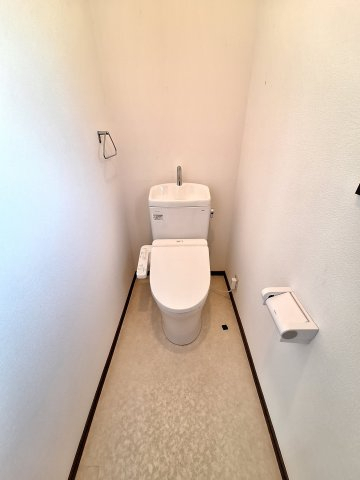 トイレ　温水洗浄便座/クリーニング中