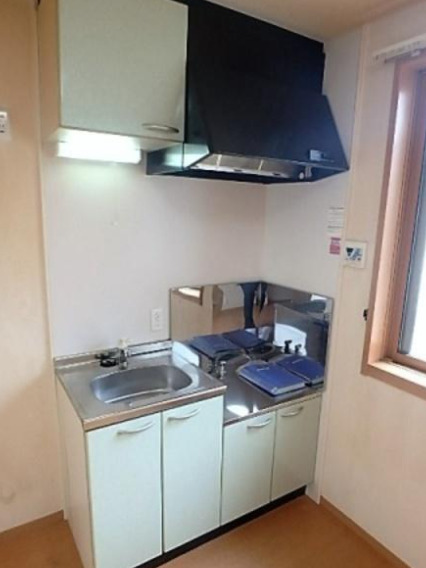 キッチン　別部屋の画像を使用しております。