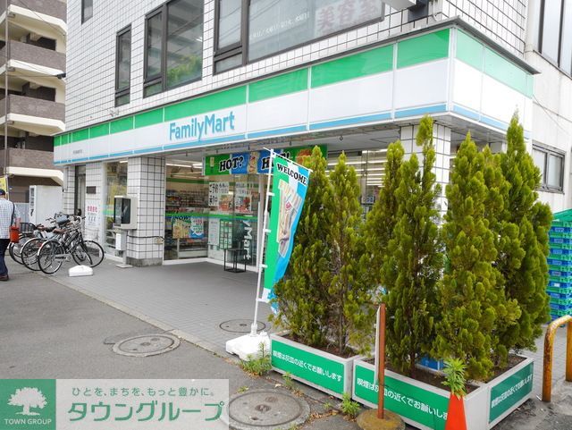 コンビニ　ファミリーマート京王稲城駅前店（コンビニ）まで380m