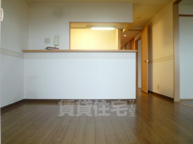 グドゥウェル新石切の居間写真