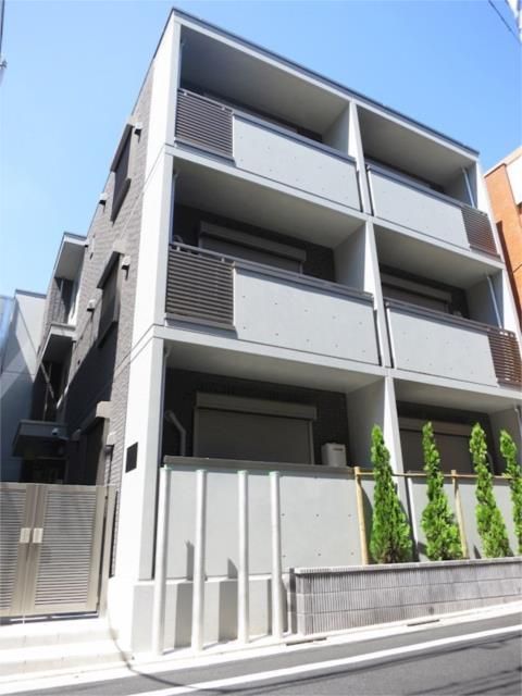 建物外観　鉄筋コンクリート造・総戸数は9戸です。