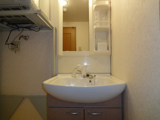 洗面設備　※同じ階の部屋の画像です