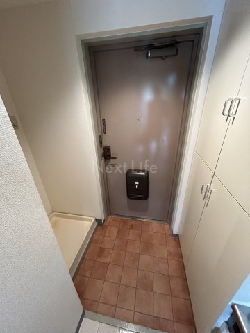 パインコート立川の玄関写真