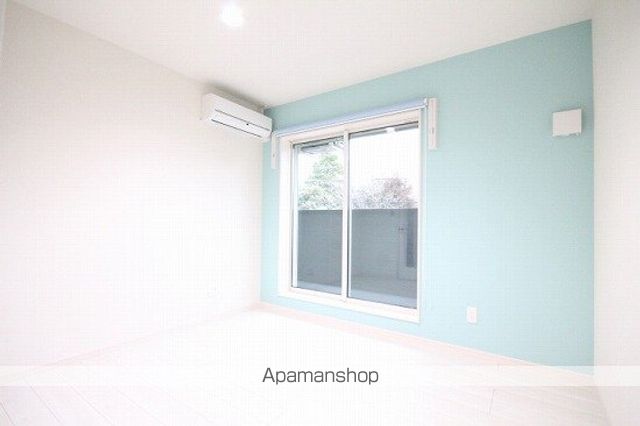 プレジール小本の居間写真