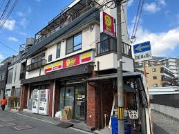 コンビニ　ニューヤマザキデイリーストアくにじま駅前店（コンビニ）まで348m