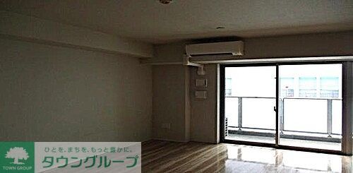 ライオンズ篠崎駅前レジデンスの居間写真
