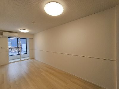 グレースヒルズGAMO A棟の居間写真