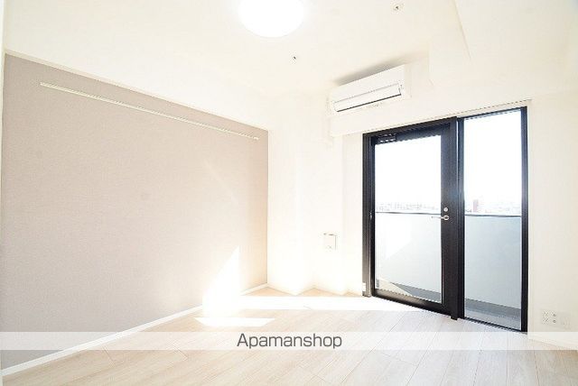 ステージグランデ亀有アジールコートの居間写真