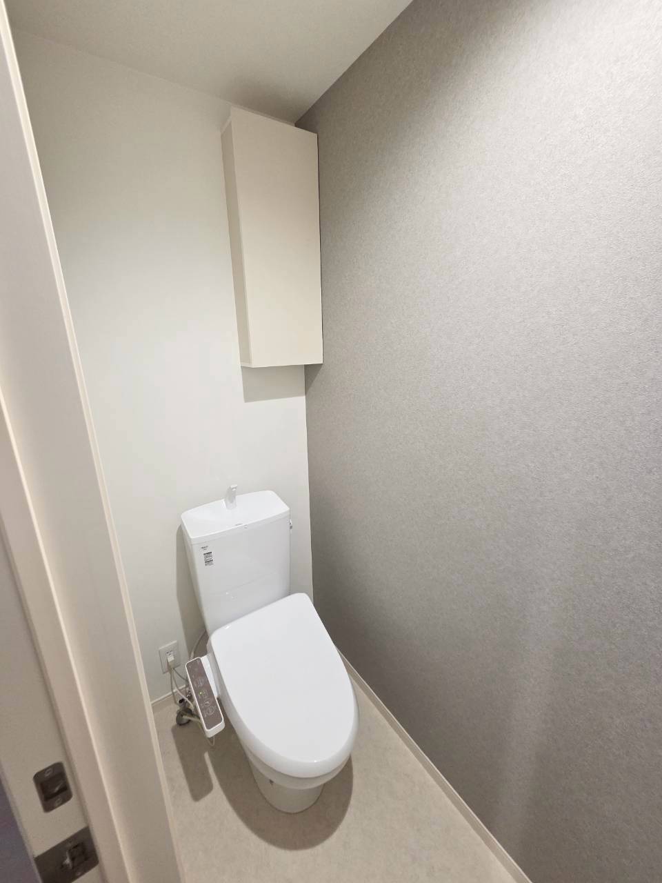 マタン南町A棟 蔵収納11.9平米のトイレ写真
