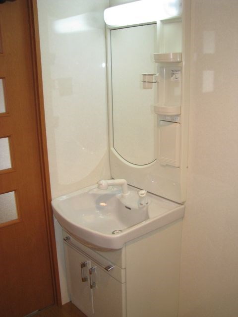 洗面設備　※別号室の参考写真です。