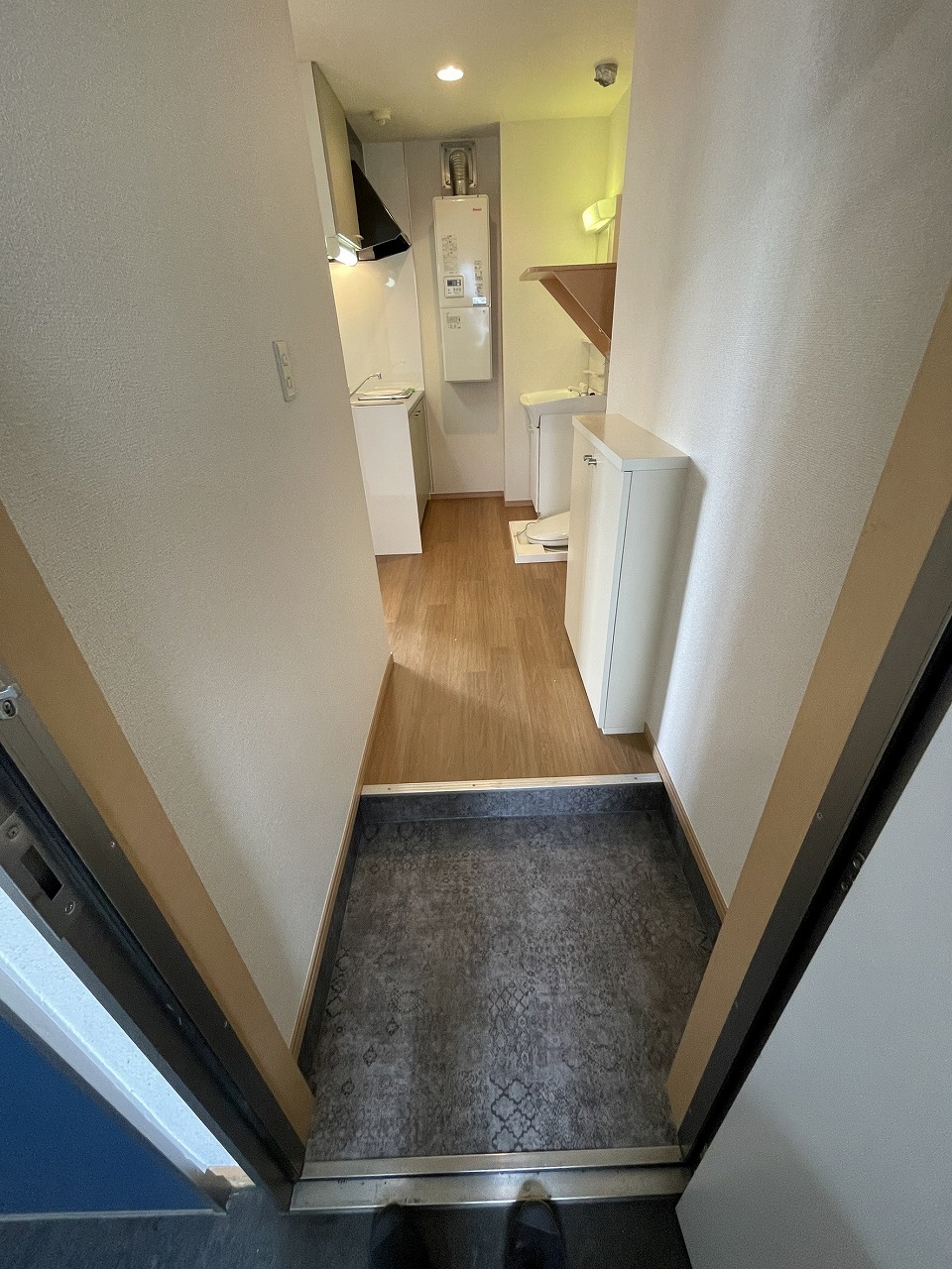 玄関　※退去前のため、以前の写真を使用しています。