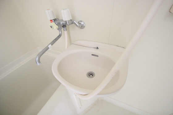 洗面設備　※別号室の写真です