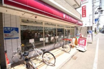 コンビニ　ナチュラルローソン 成城六丁目店（コンビニ）まで946m