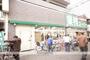 スーパー　業務スーパー十三店（スーパー）まで1129m