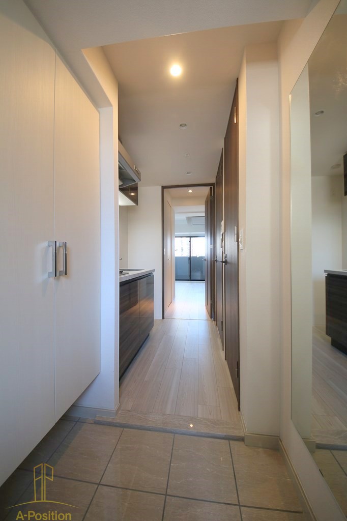 玄関　ファーストフィオーレ京橋ブレイニー