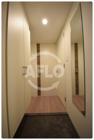 玄関　セレニテ谷九プリエ　玄関