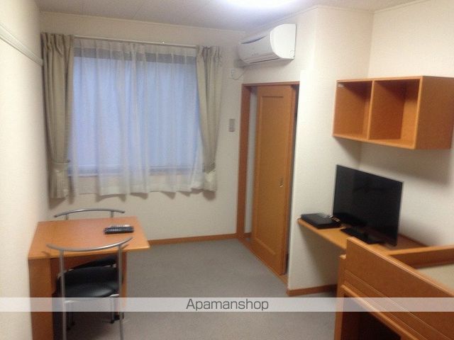 レオパレスパークヒルズの居間写真