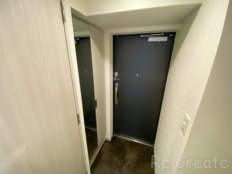 プレサンス堺筋本町エグゼブランの玄関写真