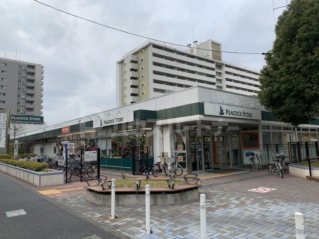 スーパー　ピーコックストア大島店（スーパー）まで130m