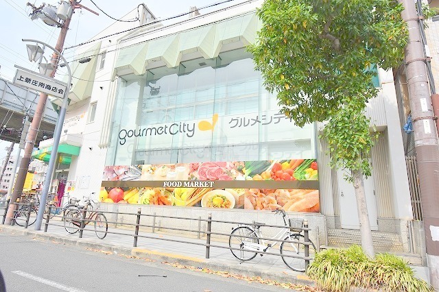 スーパー　イズミヤ　上新庄店（スーパー）まで1043m