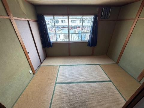 メゾンド春日の居間写真