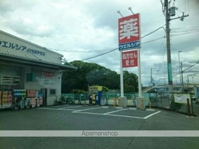 ドラックストア　ウエルシア羽曳野伊賀店様（ドラッグストア）まで940m