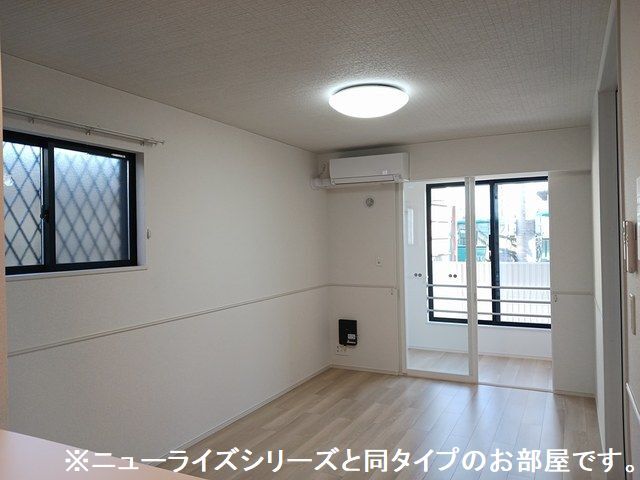 グランソレイユ Yの居間写真