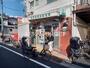 郵便局　世田谷粕谷郵便局（郵便局）まで606m