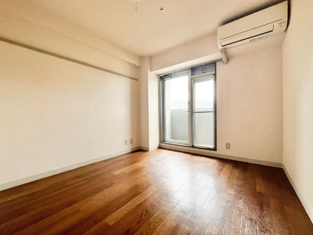 カレッジタウン1号棟の居間写真